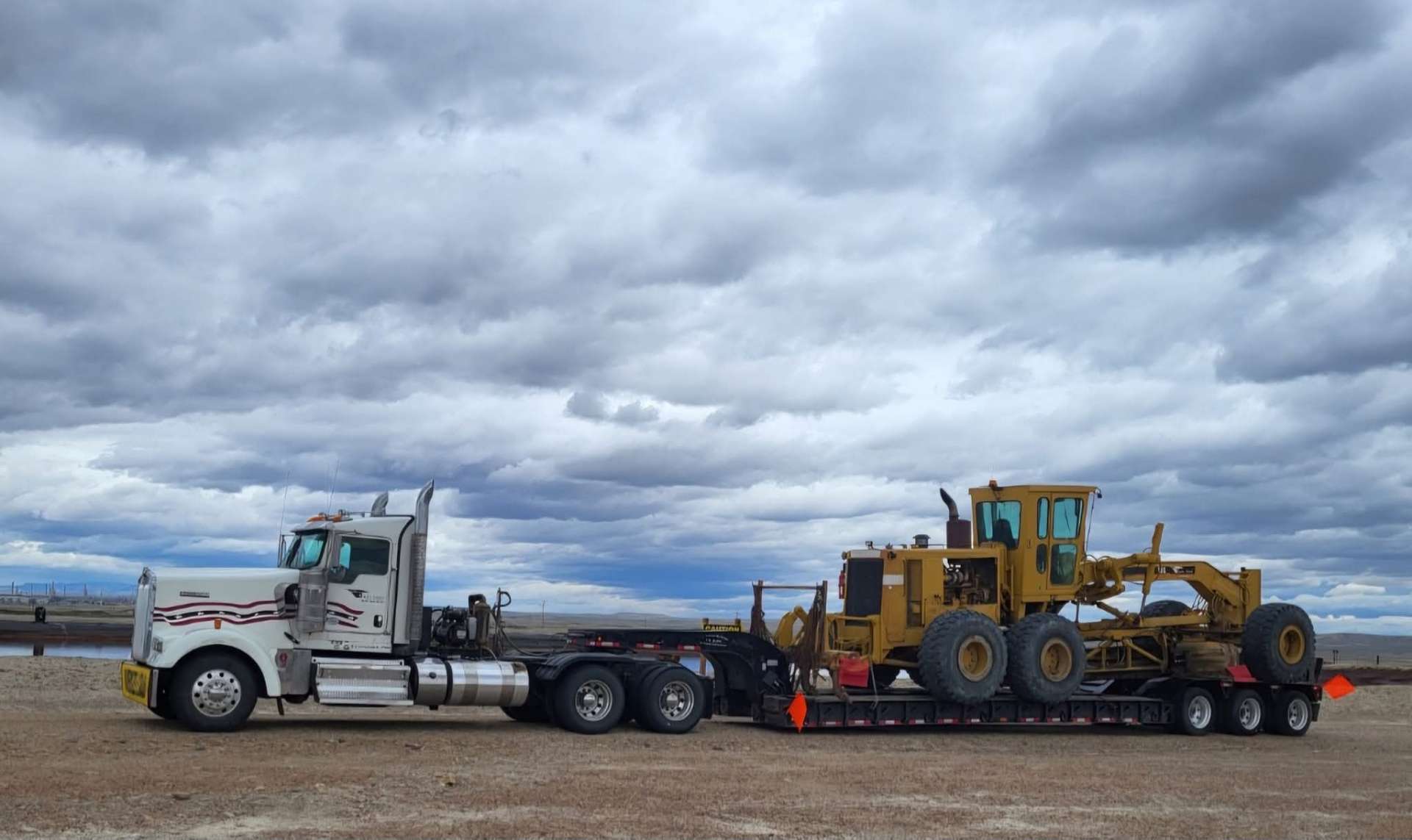 Belly dump hauling gravel in the Wyoming high desert